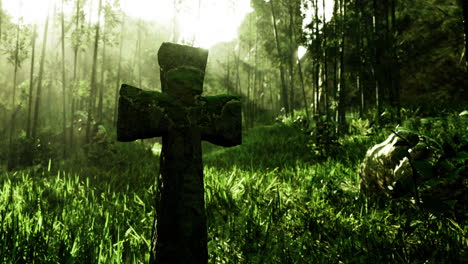 moss covered cross stands tall in a serene forest landscape at dawn