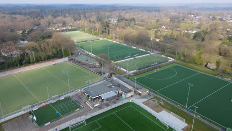 aerial of soccer and hockey fields at the edge of a small town