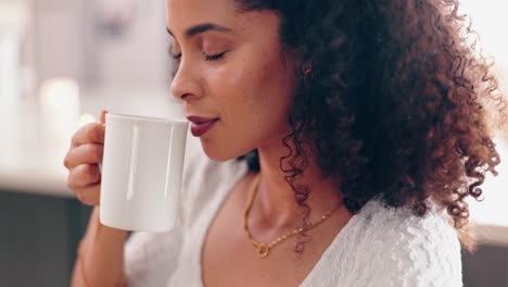 woman enjoying a warm drink