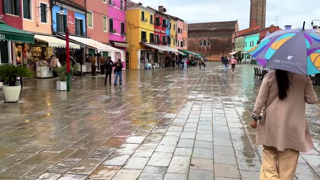 rainy day stroll through burano's colorful streets