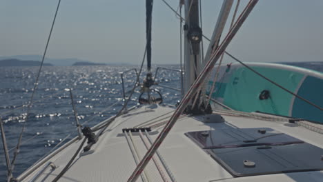 view from a yacht of a greek island at sunrise