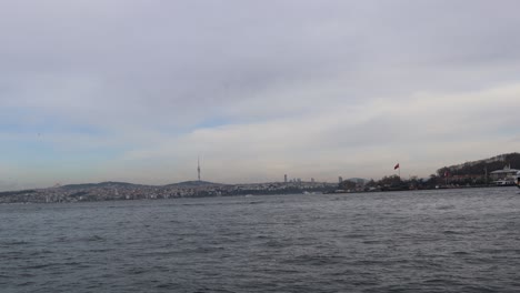 Turyol-Ferry-Boats-Across-Golden-Horn-In-Istanbul,-Turkey-At-Dusk