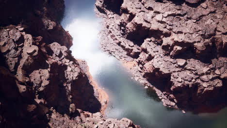 aerial view of a canyon with a river running through it