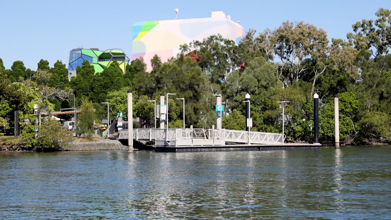 Boat approaching and docking at canal pier
