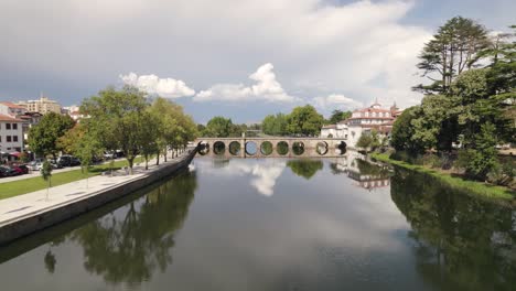 aerial forward view on ground level over river tamega