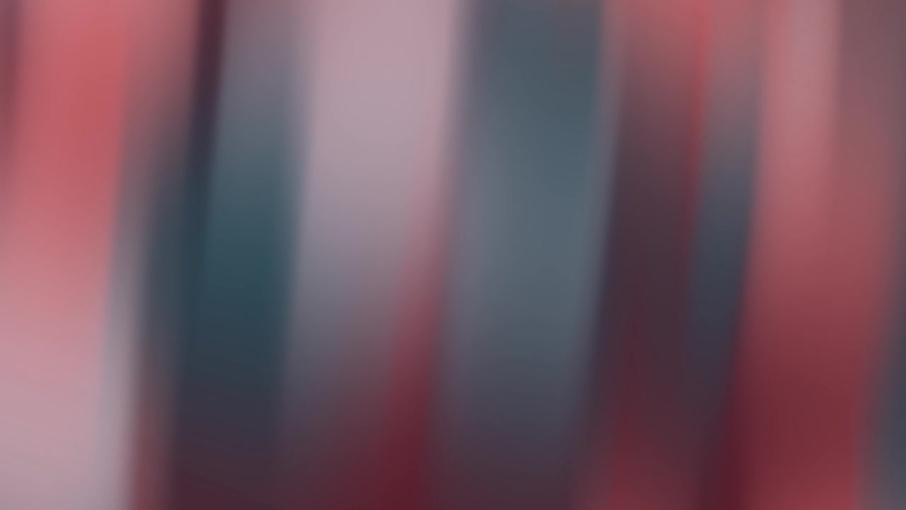 Dynamic Abstract Background of Blurred Vertical Red and Teal Lines