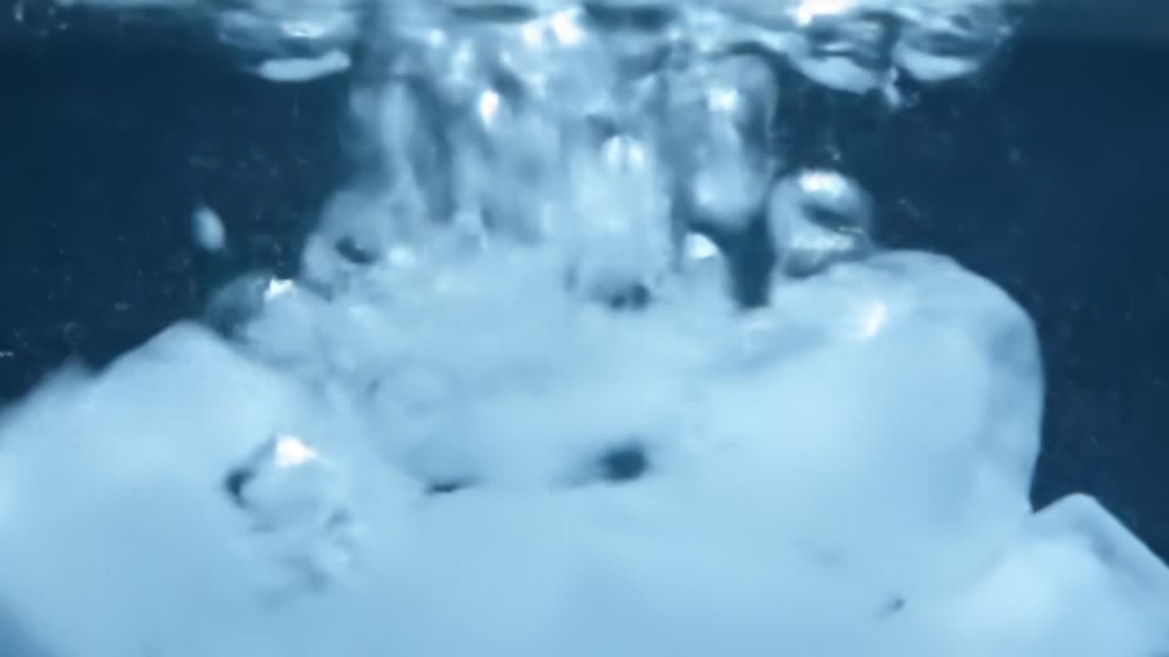 Bubbles Rising in Clear Water Capture the Beauty of Fluid Motion and Tranquility