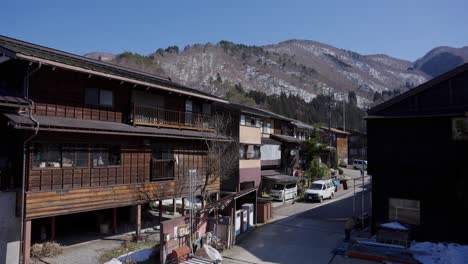 early spring snow begins to melt in shirakawago, gifu japan