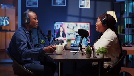 show host recording podcast, enjoying cup of coffee and nice conversation with guest