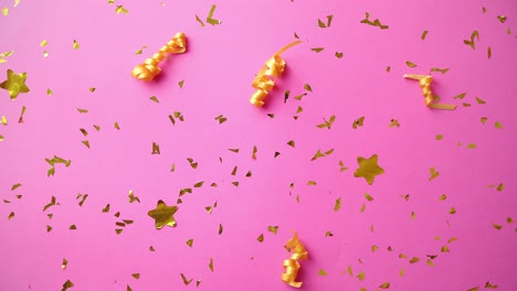 fondo de fiesta rosa con confeti dorado y serpentinas
