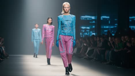dynamic fashion showcase featuring unique textures and bold color combinations on the runway, captivating the audience with innovative designs and styles