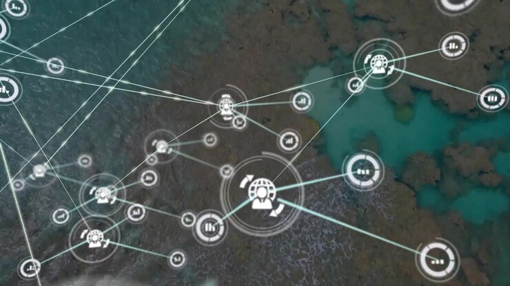 Netværksoverlejring pulserer fra en central hub, udvider linjer og noder, visualiserer data om kystrev.