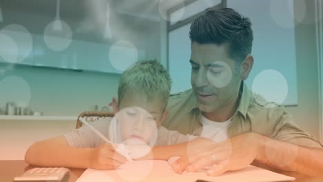 Animation-of-bokeh-over-happy-caucasian-father-helping-son-doing-homework