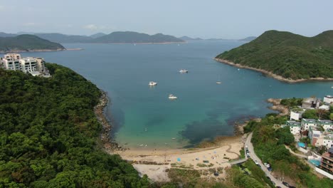 Hong-Kong-Sheung-Sze-Wan-Beach-and-Tai-Hang-Hau-Village,-Aerial-view