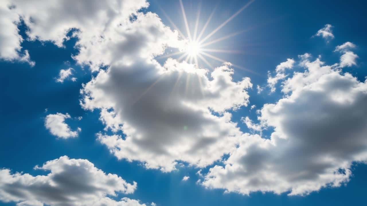 A Beautiful Display of Sunlight and Clouds in the Sky, Capturing the Essence of a Serene and Bright Day Outdoors