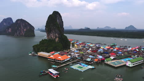 floating fishing village island of ko panyi in phang nga bay, thailand