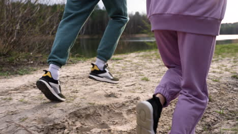 couple running in the forest