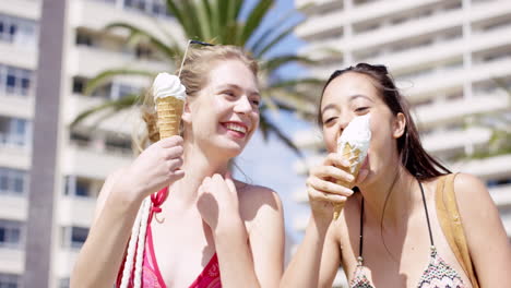 close up portrait teenage girls eating ice cream in the summer on vacation