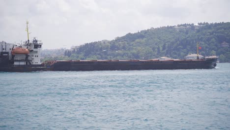 commercial ship passing through the strait.