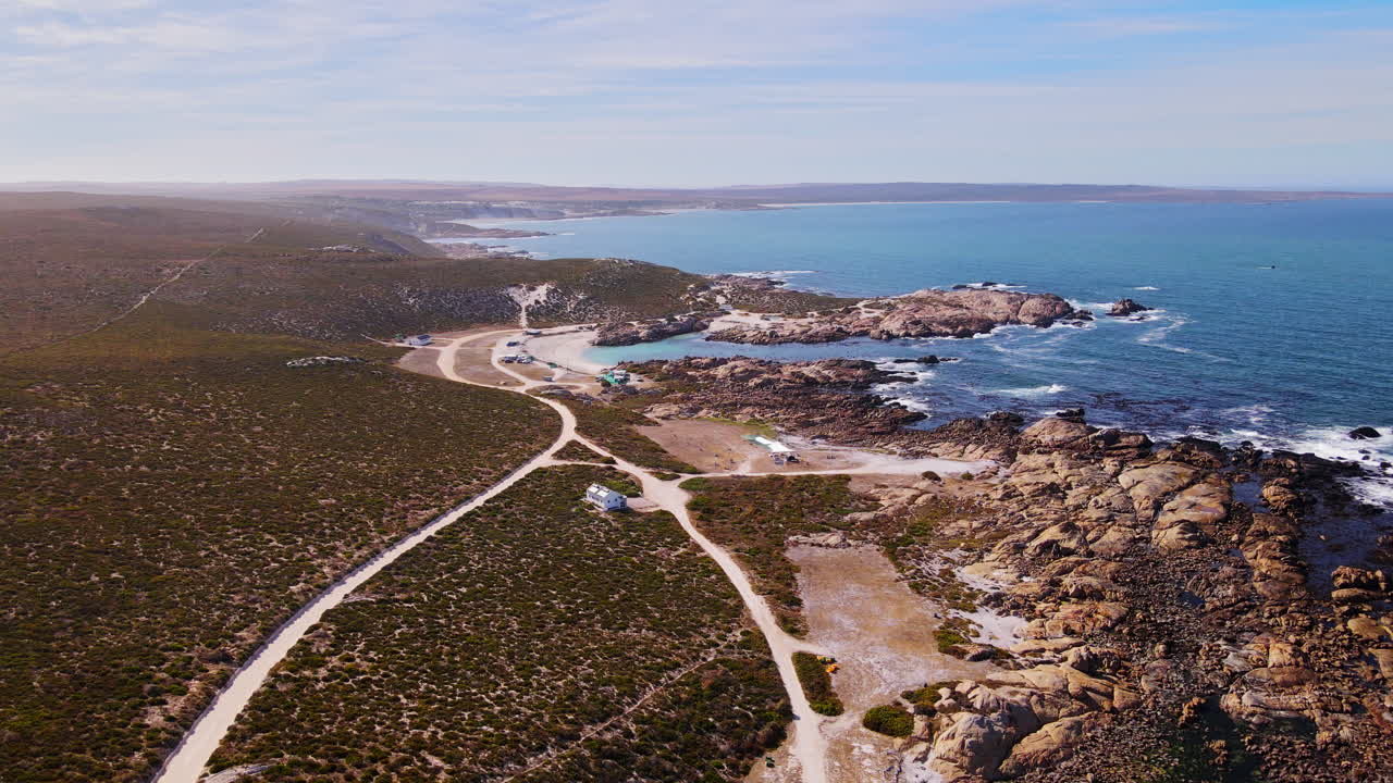Descending aerial view over Cape Columbine nature reserve on Cape West Coast