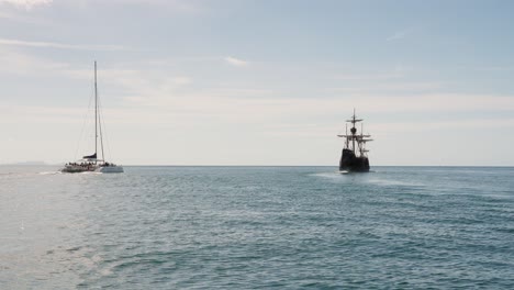 Caravel and catamaran on the Atlantic ocean