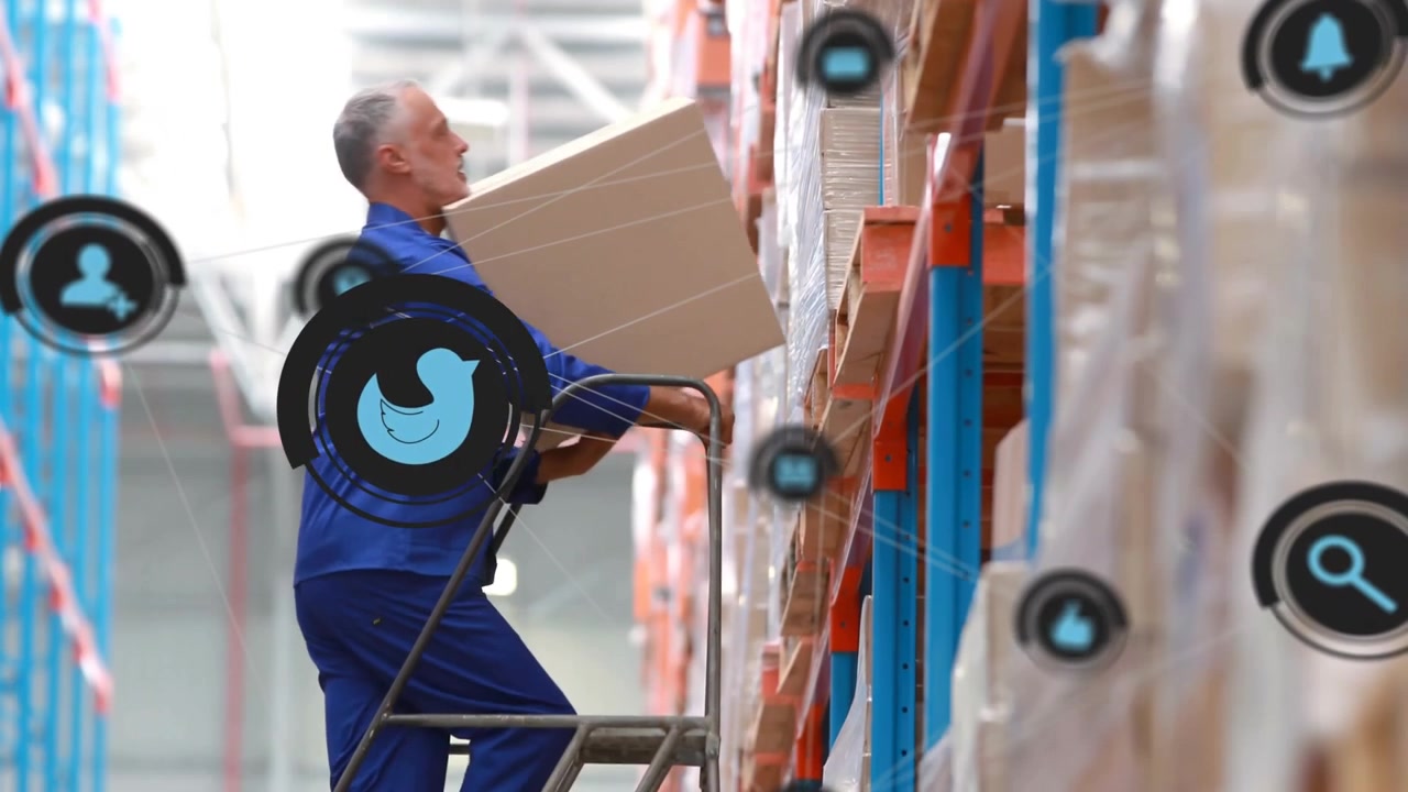 Senior warehouse worker positioning ladder and activating connectivity icons while retrieving box