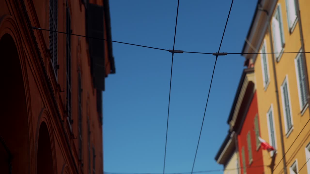 Colorful European City Street with Arches and Buildings