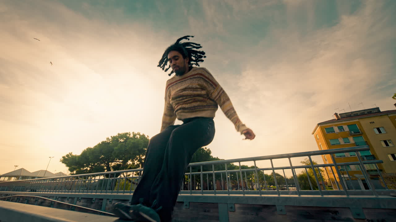 Parkour Jump on a Bridge at Sunset