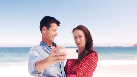 happy couple taking selfie