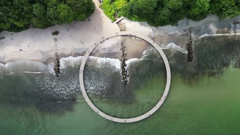 the infinite bridge top down aerial aarhus denmark with ocean