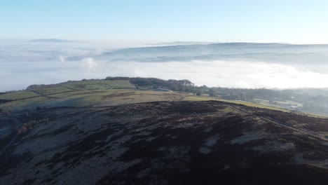 cloudy misty sunrise valley aerial moorland hiking hillside farmland lancashire pull back