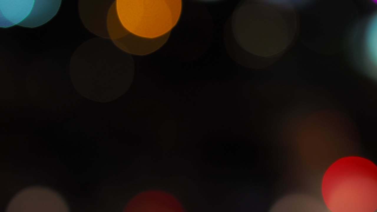 blur focus of light on black background from lamp in night on christmas before new year 2018 so beautiful romantic holiday