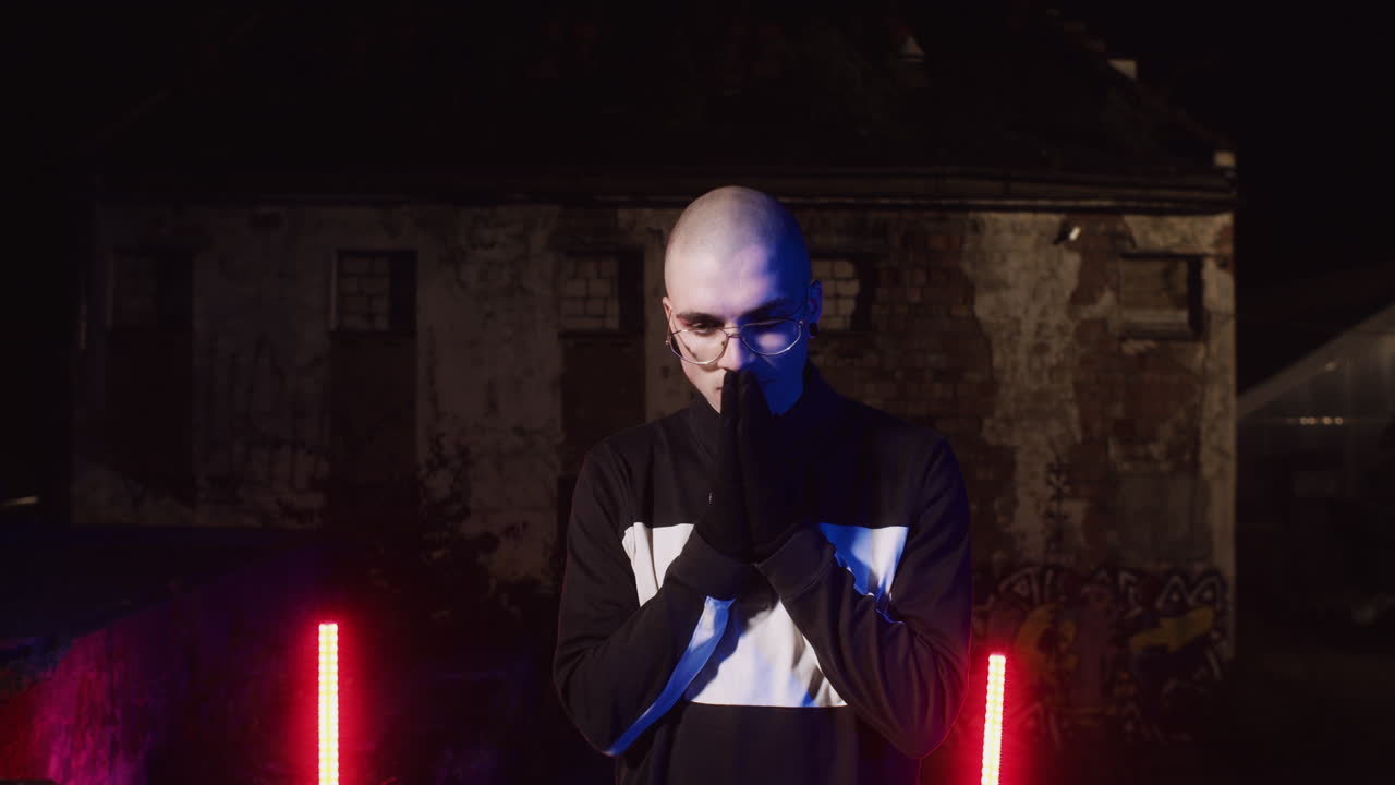 Man in Stylish Clothing at Night