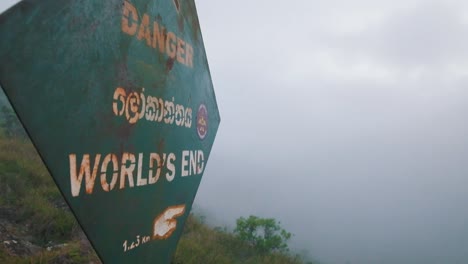 world's end warning sign on the steep hill.