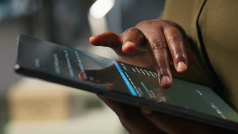 close up of programmer utilizing ai on tablet to optimize performance
