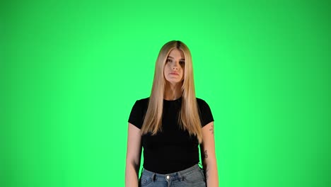 funny and playful woman in green screen