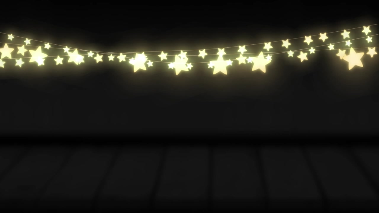 Animation av gula stjärnformade glödande ljusslingor hängande mot en svart bakgrund med utrymme för text.