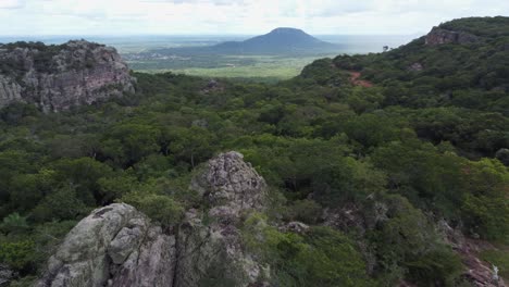 Aerial-revolves-over-rugged-rocky-crag-landscape-in-rural-Bolivia,-Chiquitania