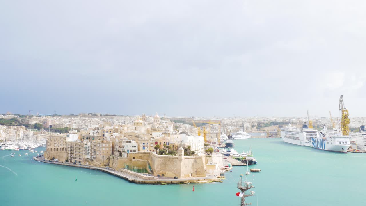 Beauty of Maltese city with moored luxury cruise ships, static view