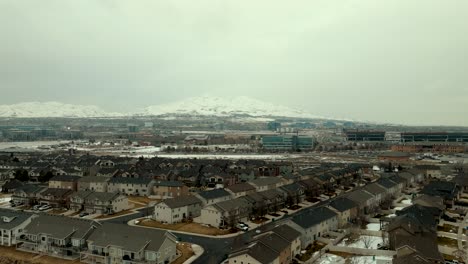 Silicon-Slopes-Lehi,-Utah-in-winter---aerial-parallax