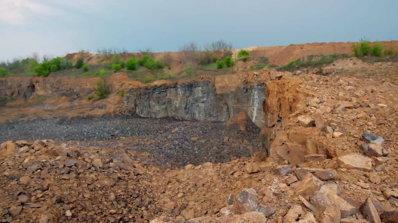 View of mining quarry. Relief of the quarry for mining against the background