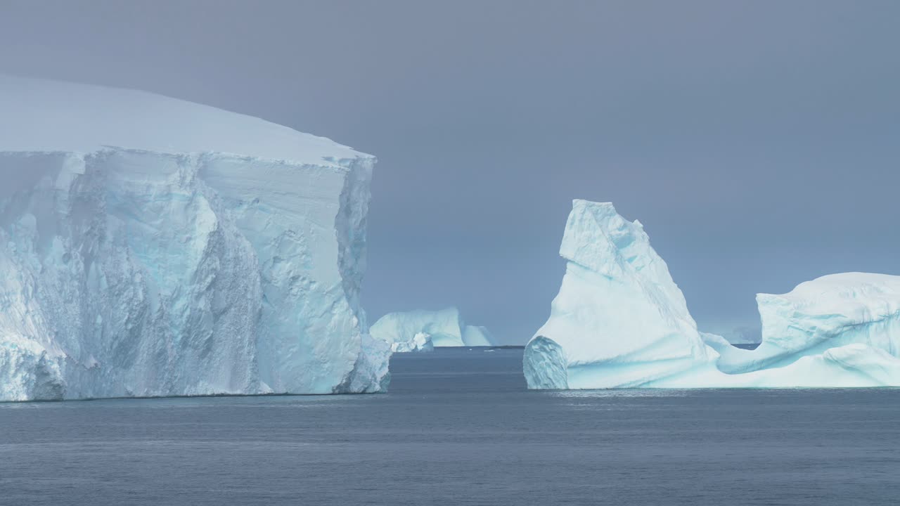 Icebergs Near Coast of Antarctica, Massive Ice Floating in Cold Pacific Ocean Water
