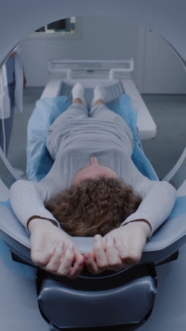 woman undergoing a ct scan