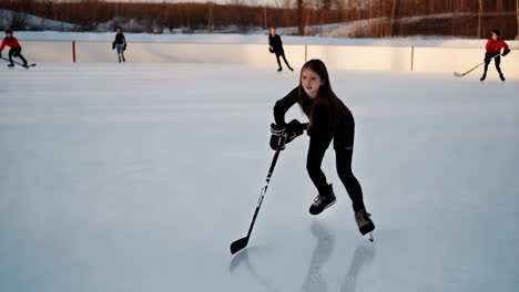 girl playing ice hockey