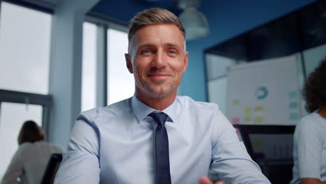 businessman having online video conference. entrepreneur showing thumb up