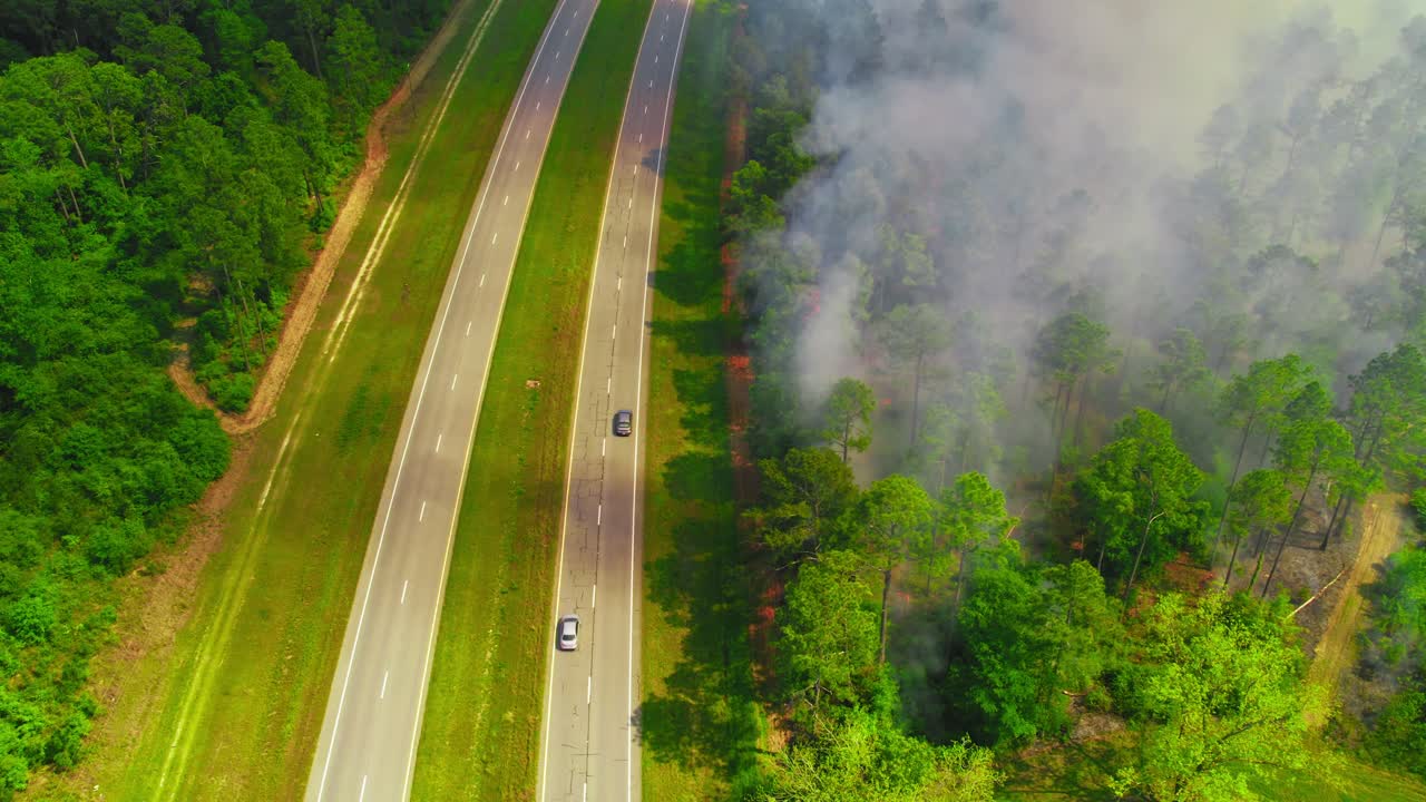 Aerial View of Wildfire and Dense Smoke Near Highway in Georgia, USA