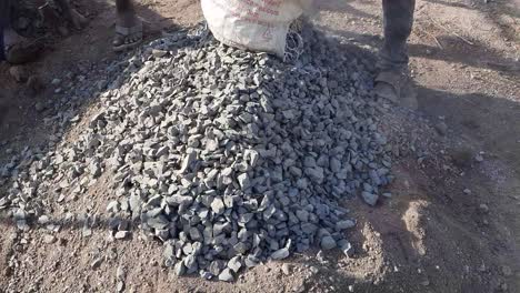 construction workers mixing cement concrete