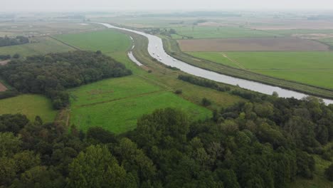 Aerial-Drone-Footage-of-the-River-Bure-in-the-Countryside-of-Norfolk