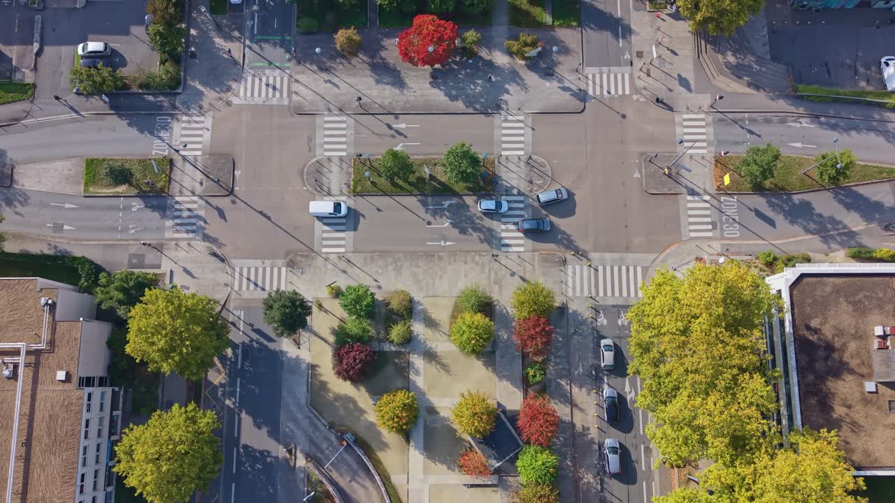 Street intersection in Henri Fréville neighborhood, urban planning and city life in Rennes, Brittany, France. Aerial top-down forward