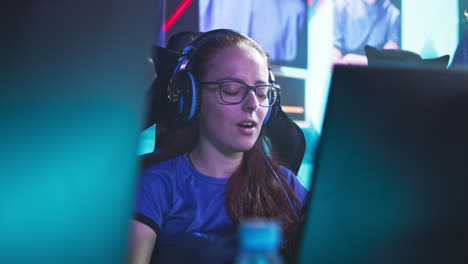female gamer at esports tournament